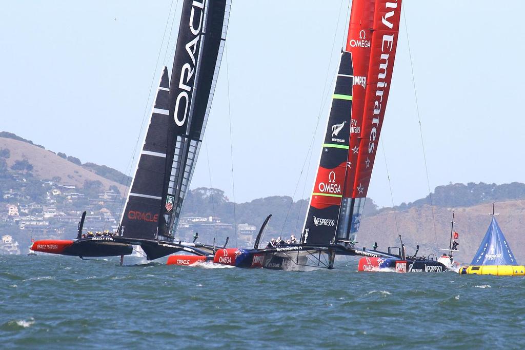 Oracle Team USA v Emirates Team New Zealand. America’s Cup Day 8 San Francisco. Emirates Team NZ holds Oracle Team USA up at the start of Race 11 © Richard Gladwell www.photosport.co.nz